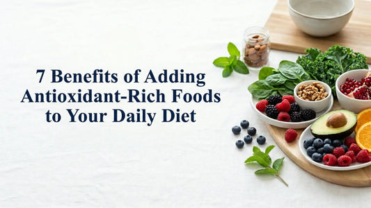 Bowl of antioxidant-rich foods including berries, avocado, leafy greens, nuts, and seeds representing healthy nutrition and daily wellness.