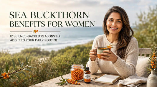 Indian woman enjoying sea buckthorn tea with berries by the coast, highlighting sea buckthorn benefits for women.